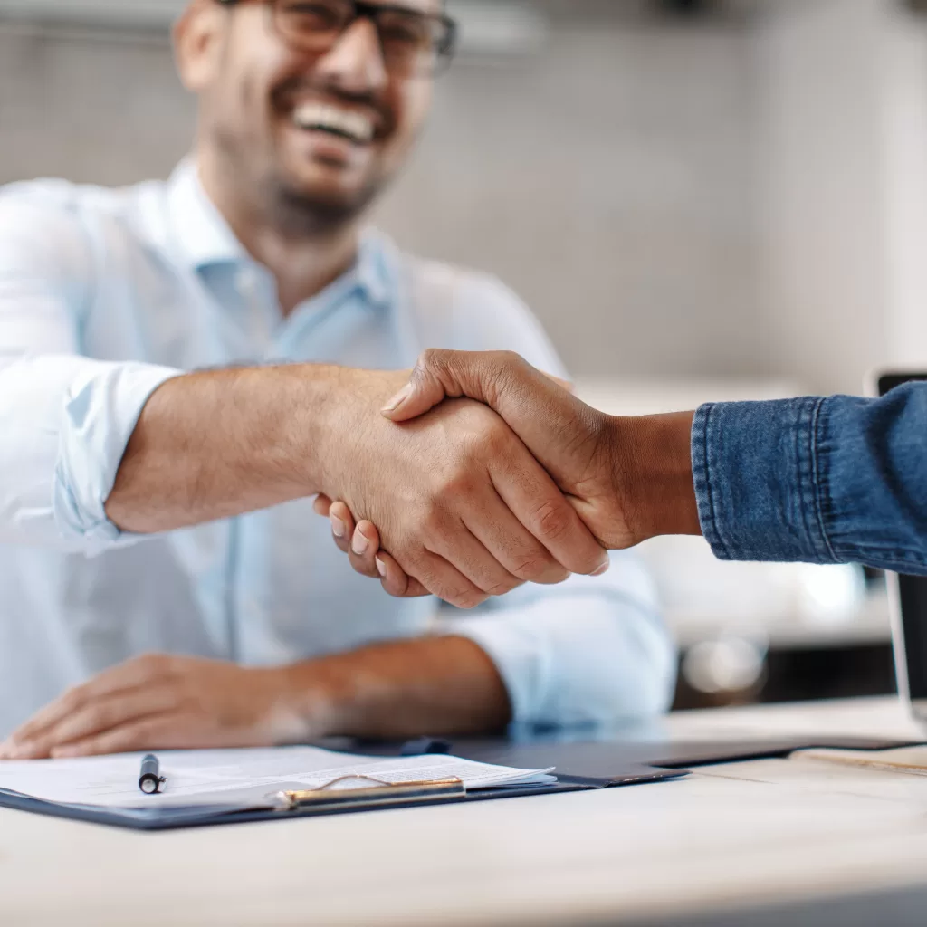 Close up of handshake in the office